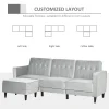 Convertible sofa bed with split-back recline feature and freestanding ottoman