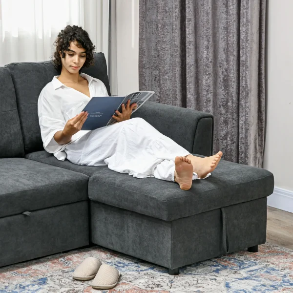 HOMCOM sofa bed folded out into a bed in a compact apartment