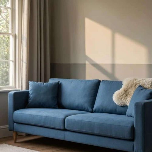 Compact reclining sofa in a cozy living room setting, highlighting space-saving design and comfort