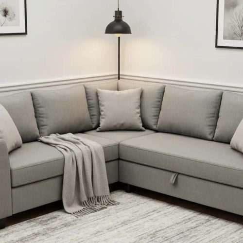 Cozy small corner sofa in a modern studio flat, highlighting space-saving comfort and style